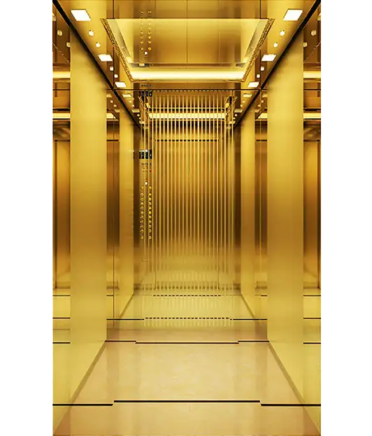A spacious gold elevator with a polished metal door, designed for passenger use.